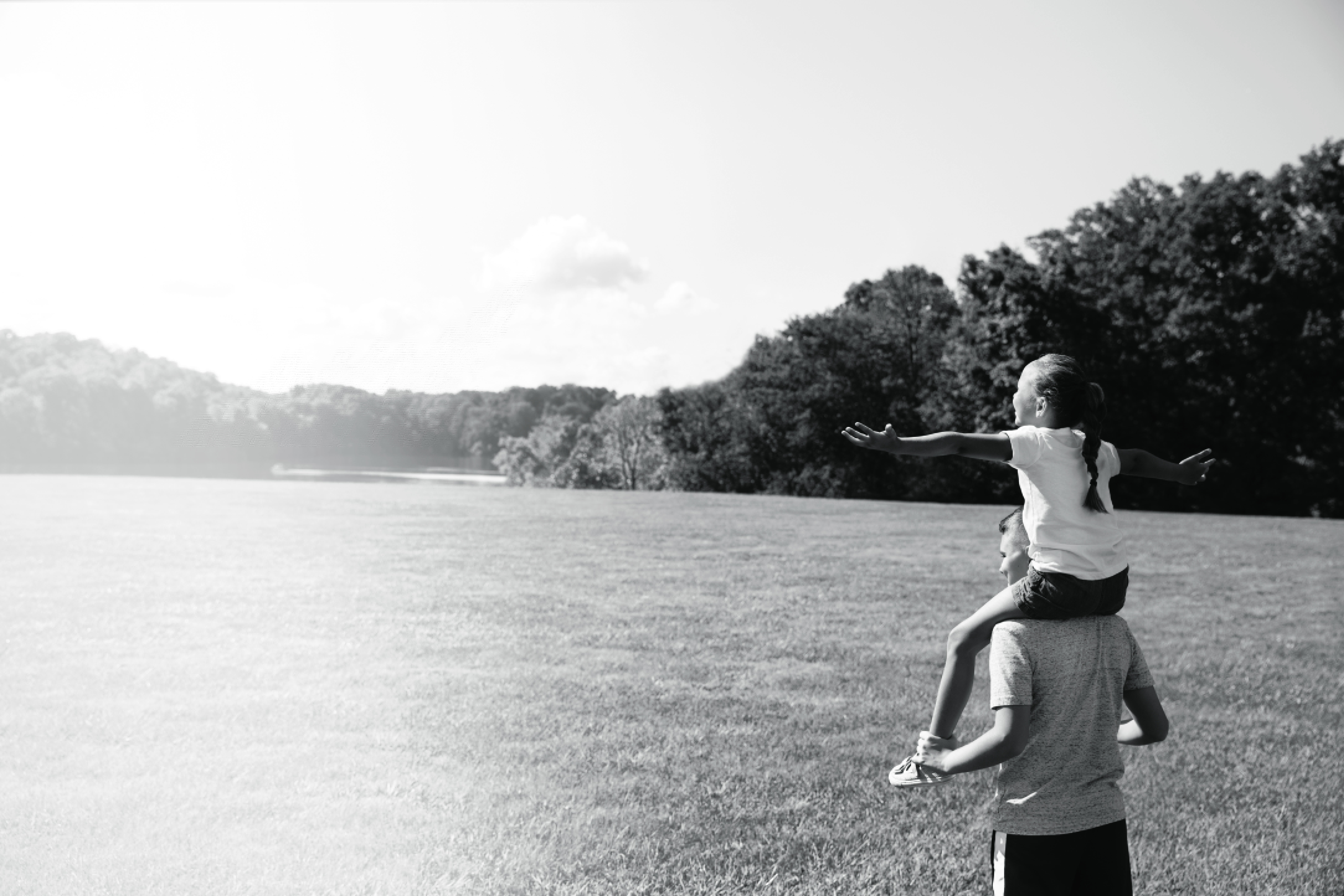 Sister on brother's shoulders