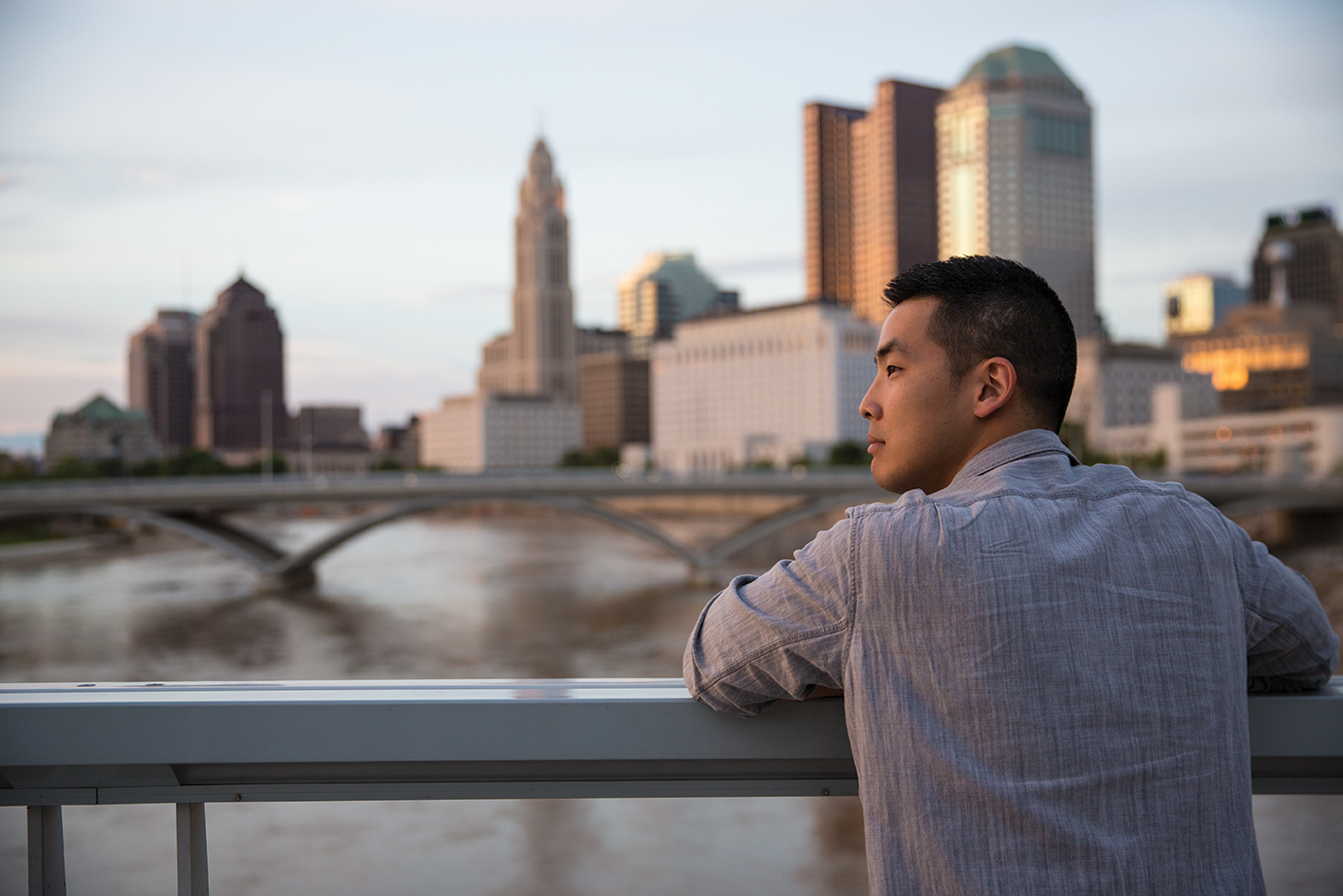 Young Man Looking at the Columbus Skyline
